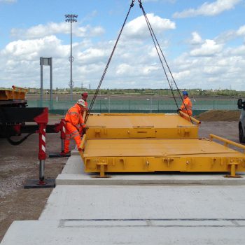 Weighbridge calibration systems being installed piece by piece