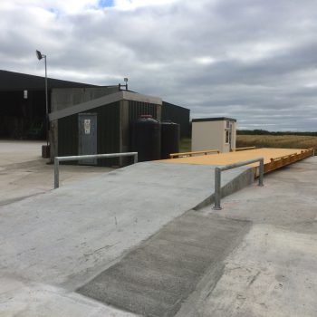 Surface mounted Eurodeck weighbridge installed with concrete ramp